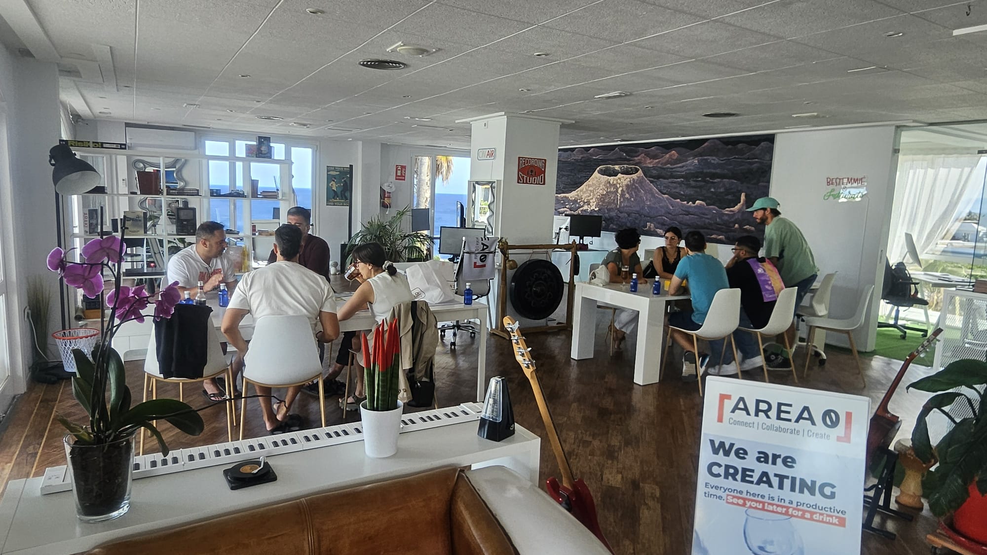 People meeting and collaborating inside Area0